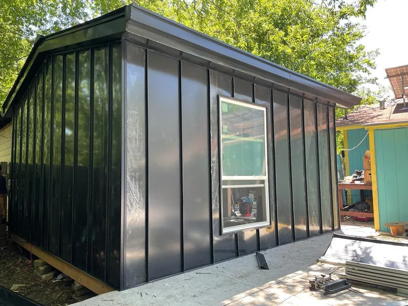 Black standing seam metal wall panels for Metal Roof Installation in Hamburg